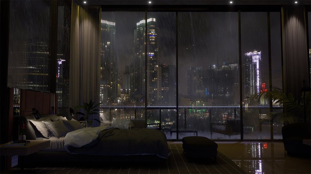 Luxury bedroom with skyline view at night